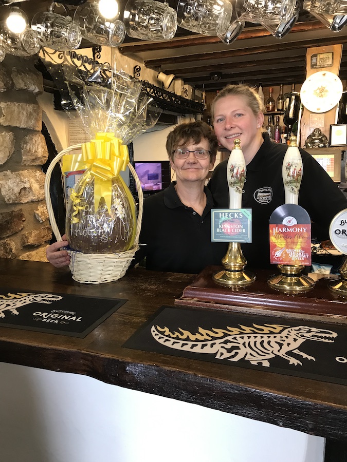 Easter Egg Raffle 2019 - Pictured is Dawn Corp (landlady of the Wagon and Horses)
with a member od staff. The winner of the Easter Egg was Margret Durston. A big thank you to the Wagon and Horses.