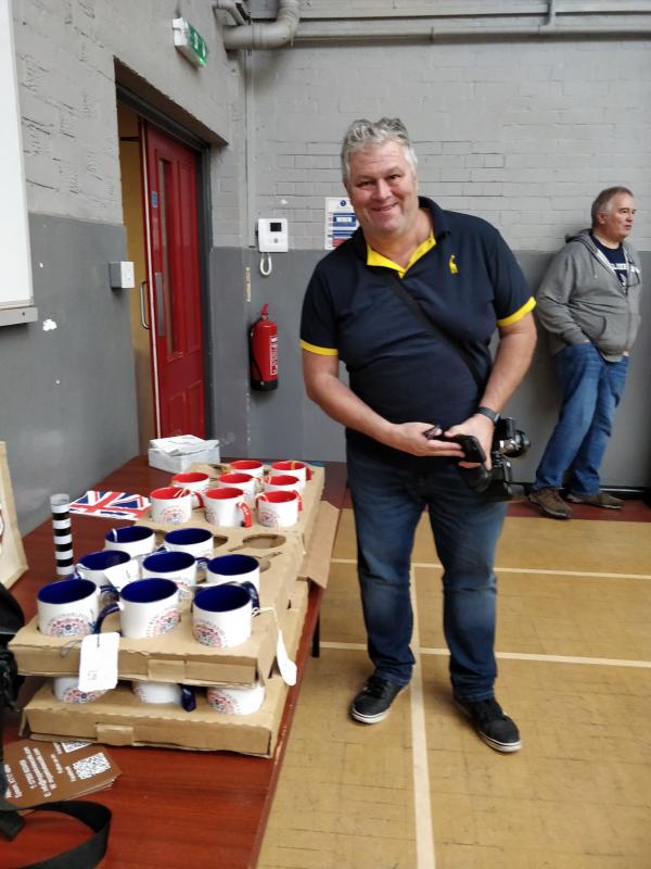 VETERANS CORONATION CELEBRATION - 02.05.2023 - Paul Taylor of What's On in Epsom with Coronation Mugs to present