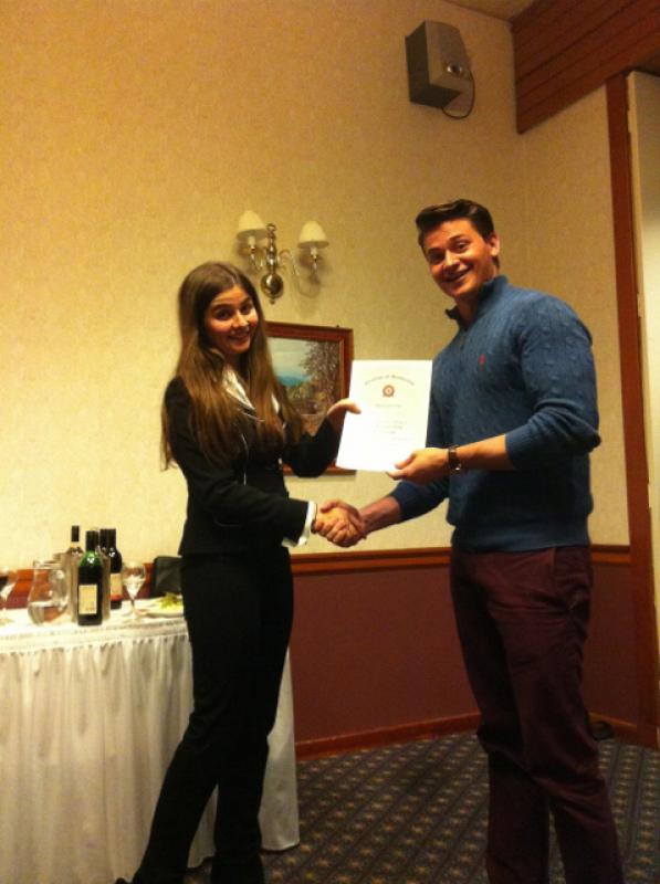 Rotaract Handover 2014 - Tea presents certificate to Emerson from Canada