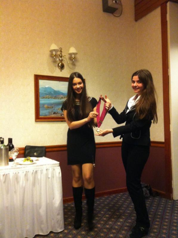 Rotaract Handover 2014 - Handover of chain of office from Tea (right) to Stasiya who is from Crimea