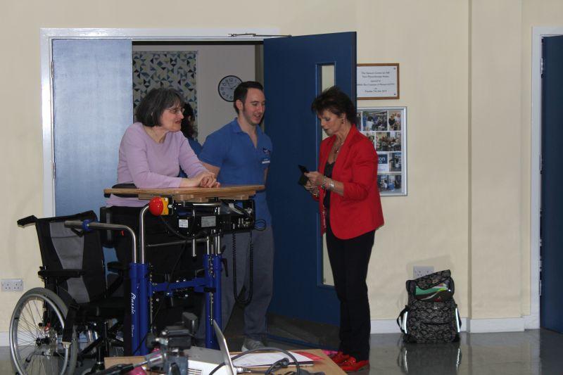 Samson Centre Project -  Rt Hon Anne Milton MP talks to one of the MS sufferers with fitness instructor Mike Chalmers