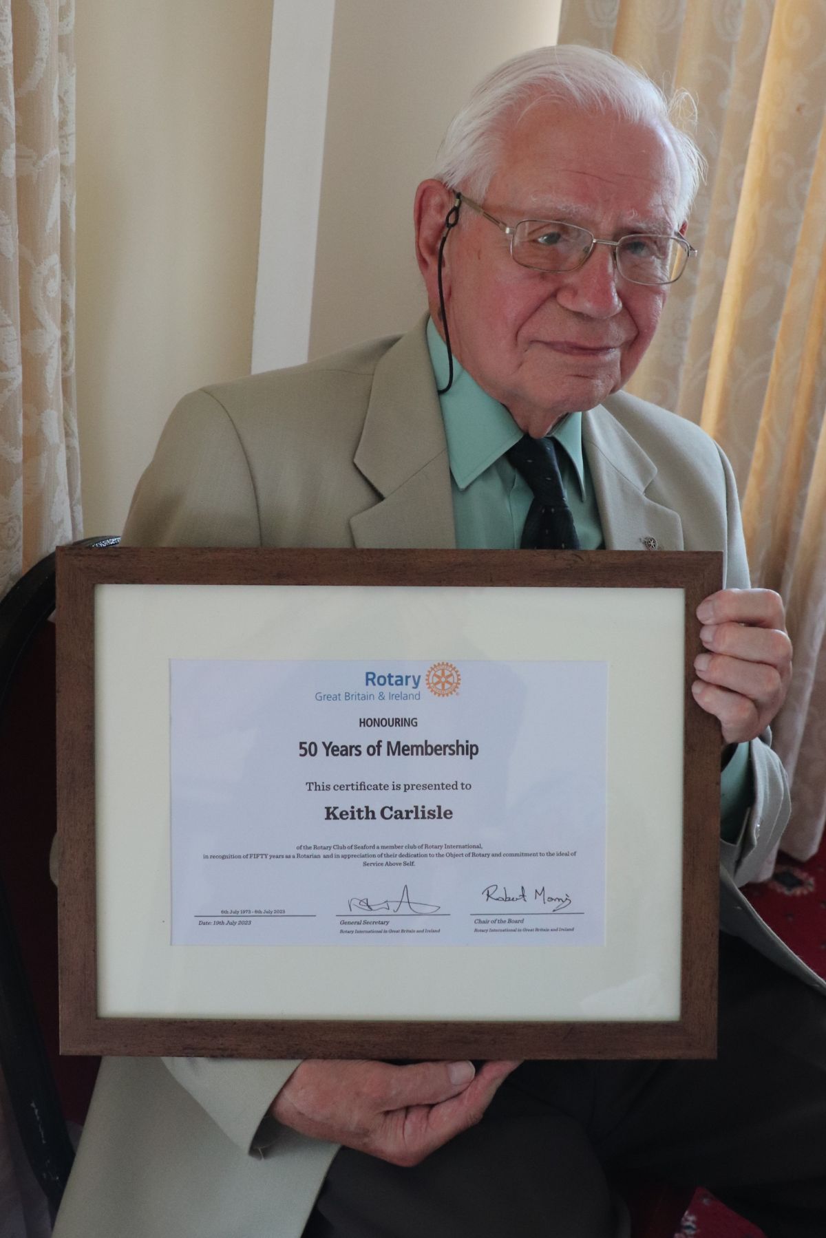 Keith Carlisle 50 Years Service Celebration - Keith Carlisle with the unique framed certificate commemorating his 50 years of service