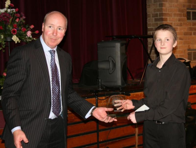 South Cotswolds Rotary Young Musician Competition 2014 Finals - Steve McNally from Magnox presenting the winners cheque to Jed