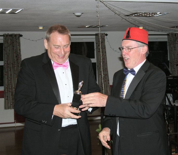 Charter Night - John Jeynes is awarded the trophy for best skittler.