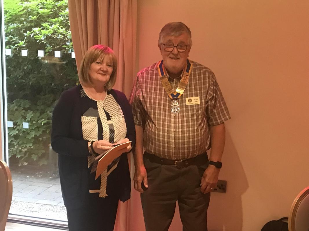 New Members - New member Julie being welcomed to the club by President Brian.