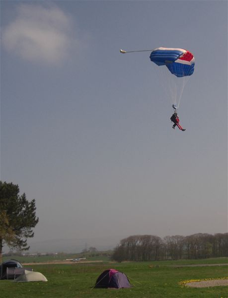 THE GREAT PARACHUTE JUMP OF 2009 - Club treasurer Nigel comes down first...
