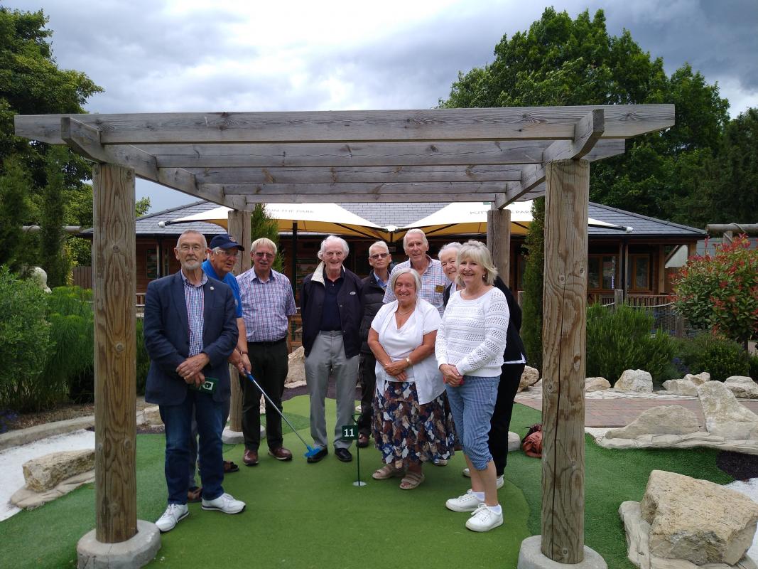 Sport - Victorious Dunmow Rotarians, Richard Harris, David Beedle, Roger Hammond and Philip Helps, with the Colchester Centenarians at the Mini Golf challenge.  