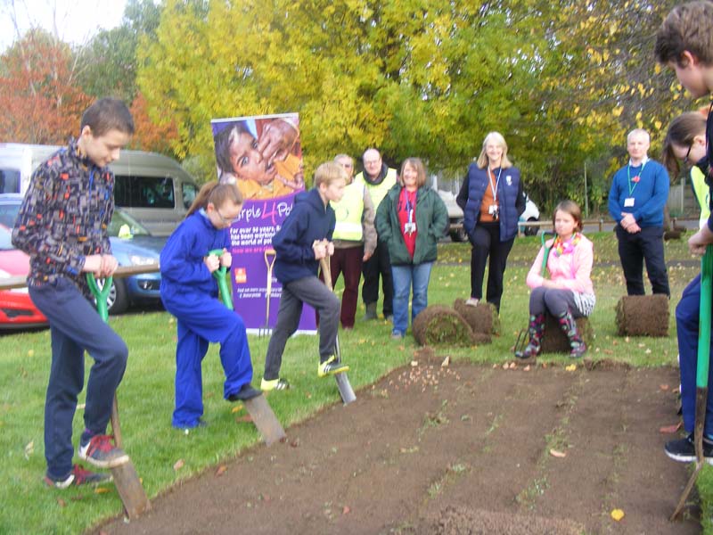 Growing Together to End Polio Now - The students almost ready to scatter the corms on the chosen planting sites, prepared by Cherwell District Council
