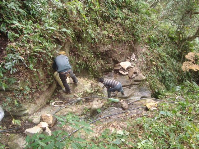 Nepal Water Project Completion Report - Plumbers work at the Water Restoration Site