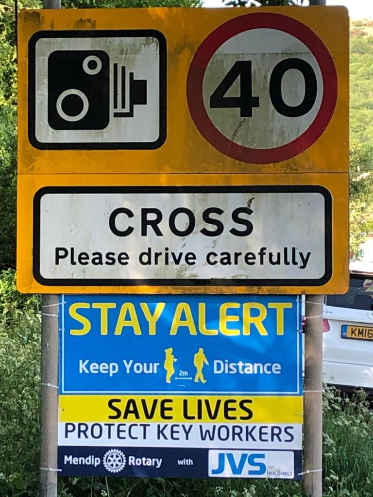 Updating the road signs to meet Government guidance - Cross Sign