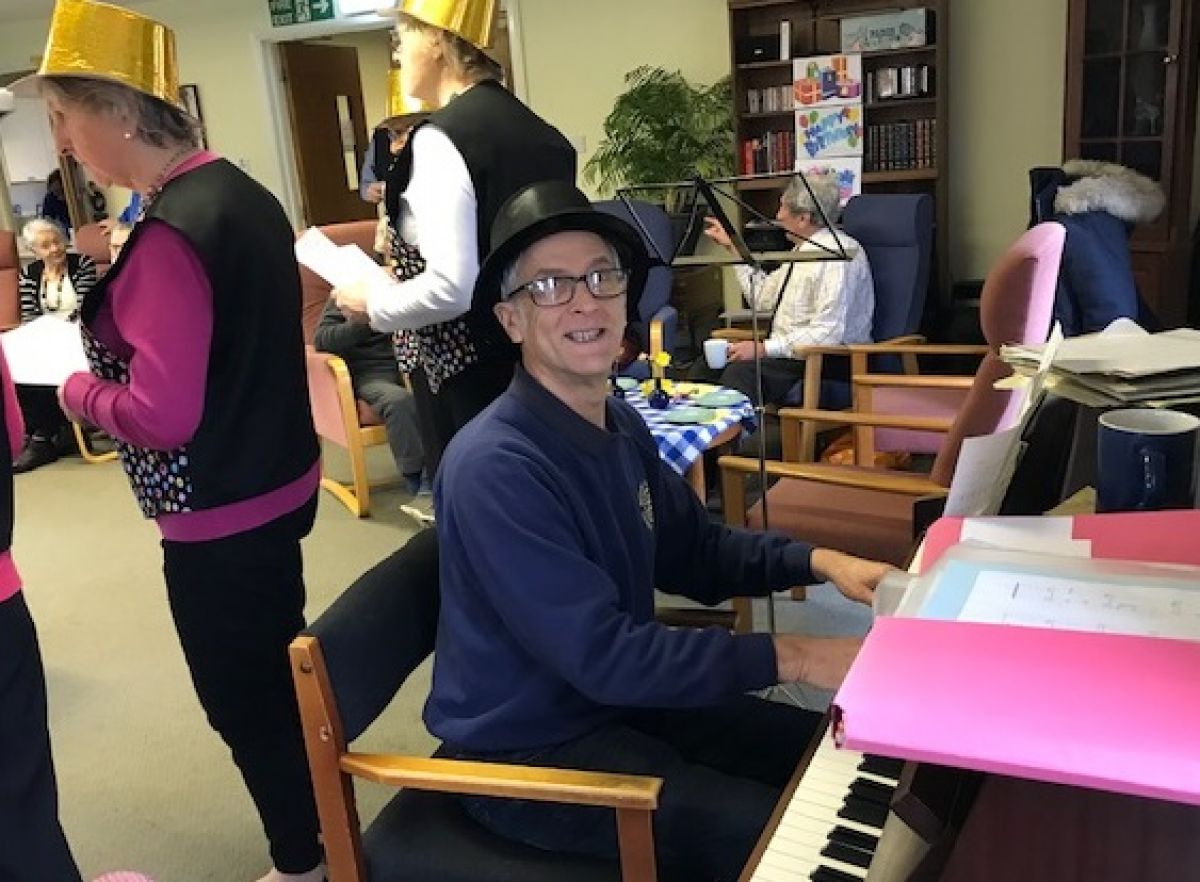 Mar 2022 Girton Memory Cafe with Entertainment - Our 11th Birthday - Alan tries out our new piano