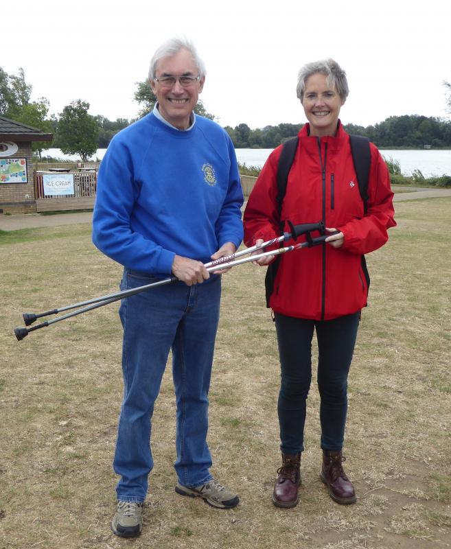 Tibbs Dementia Foundation attracts further support  - President Bob Knowles presenting a pair of poles to Sarah Russell, CEO of TIBBS Dementia Foundation