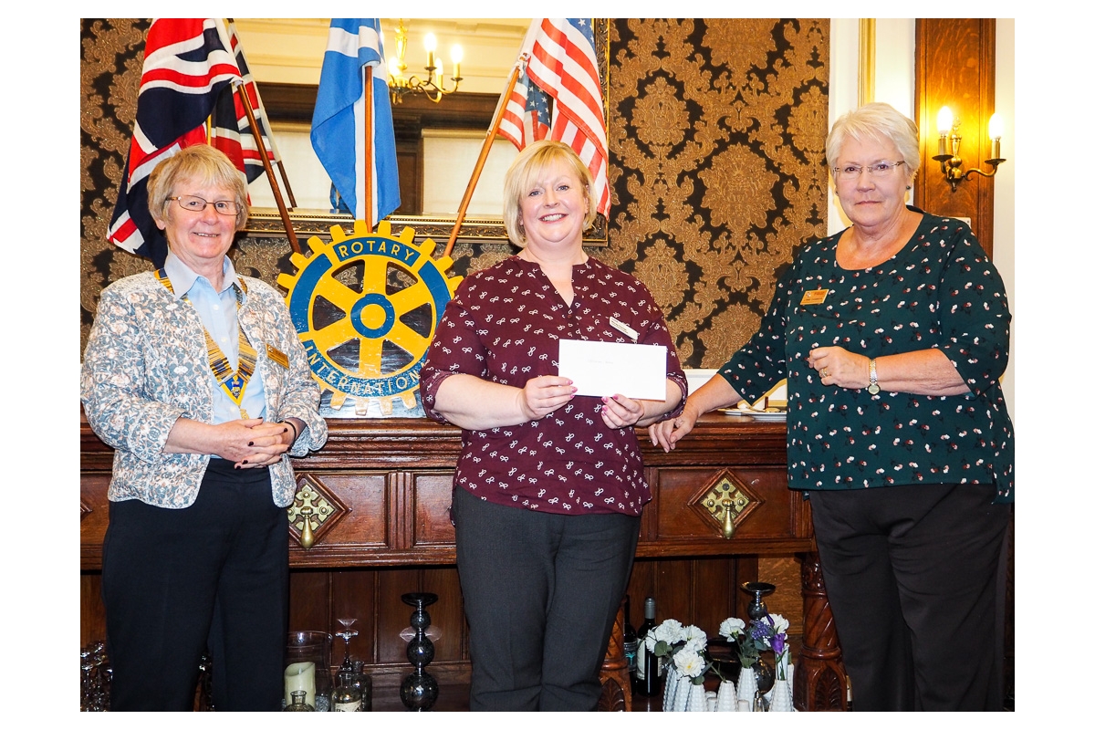 Annual Charity Disbursements - Cheque presentation to Morag Dorrian for Erksine Homes by President Ann and Rotarian Lynne