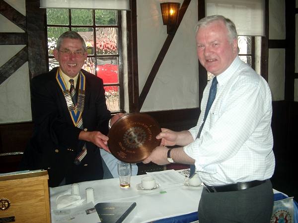 2006-07 - Robert Haig receiving the Ken Young Plate from President Ian Grieve
