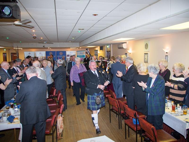 Greenock Rotary Annual Burns Supper - Piper Tommy Trotter pipes in the top table