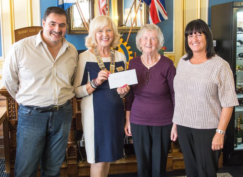 Happy Smiles on Disbursement Day - Duncan Shaw, Therese Galli and Bernie McKee receive the cheque on behalf of the Phoenix Health Project