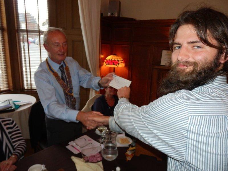 Rotary Year 2012-13 - Presenting Ryan with a cheque for the Four Peaks Challenge