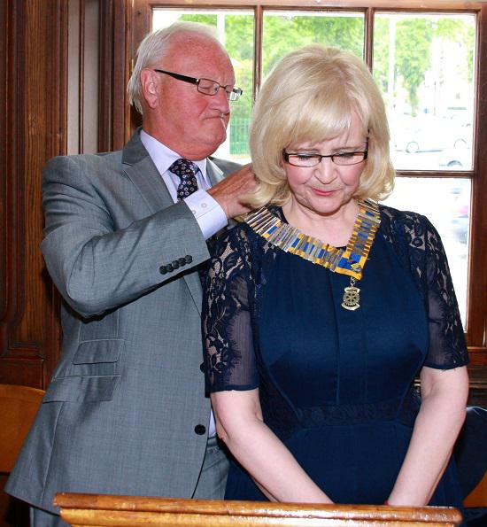 Installation of President - outgoing President Ken Melville hands over the chain of office to incoming President, Anne Hill