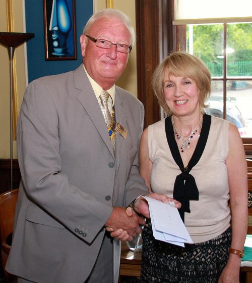2013 Greenock RC Disbursement Day  - President Ken Melville presents a cheque to Isobel Darroch from Scottish Huntingdons Association