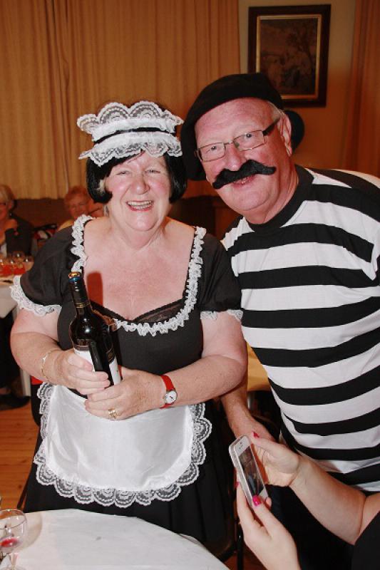 2013 French Night - Ooh la la!  - President Ken presents the prize for the best French Maid costume to Marie Speirs