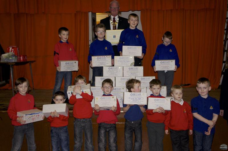 2013 Rotary Shoebox Project - President Kenny poses with the boys from 8th Greenock BB