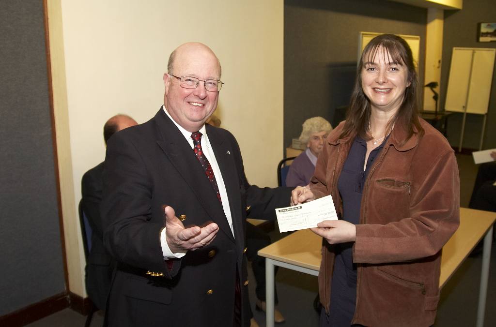 Intermediate Public Speaking 2008 - President Bill presents a prize to St Ninian's teacher, Mrs Withington