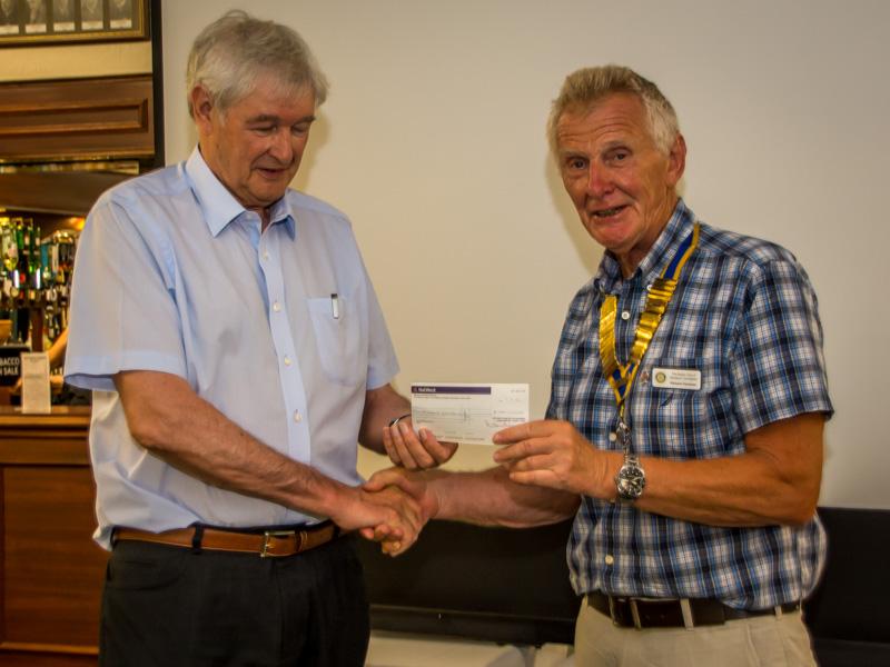 Heatons Open Gardens  - Clyde is presented with a cheque following the recent Ladies Luncheon, to be forwarded to RNLI in memory of Rhona.