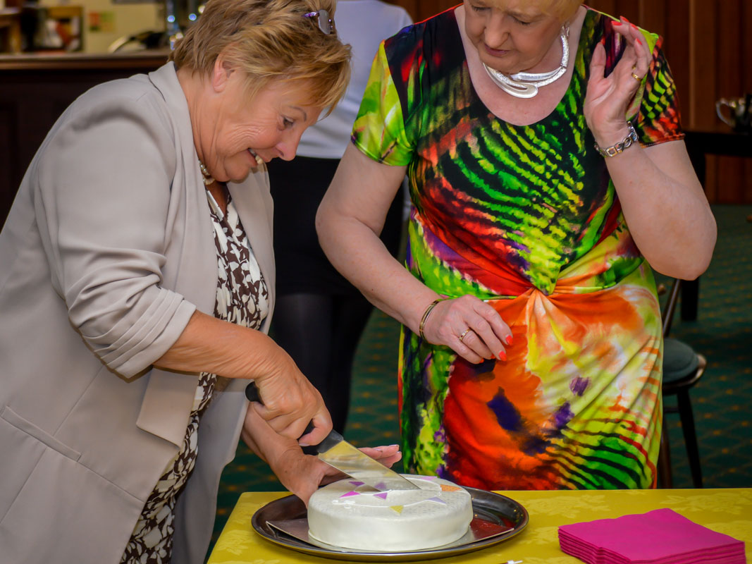Eighty and counting! - Can't trust 80 year olds with a knife, so Carol cuts the cake!