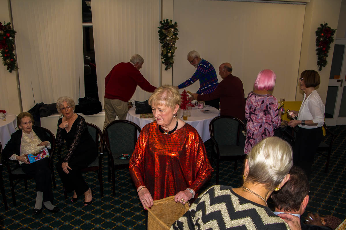 Members' Christmas Party - Barbara getting things organised.