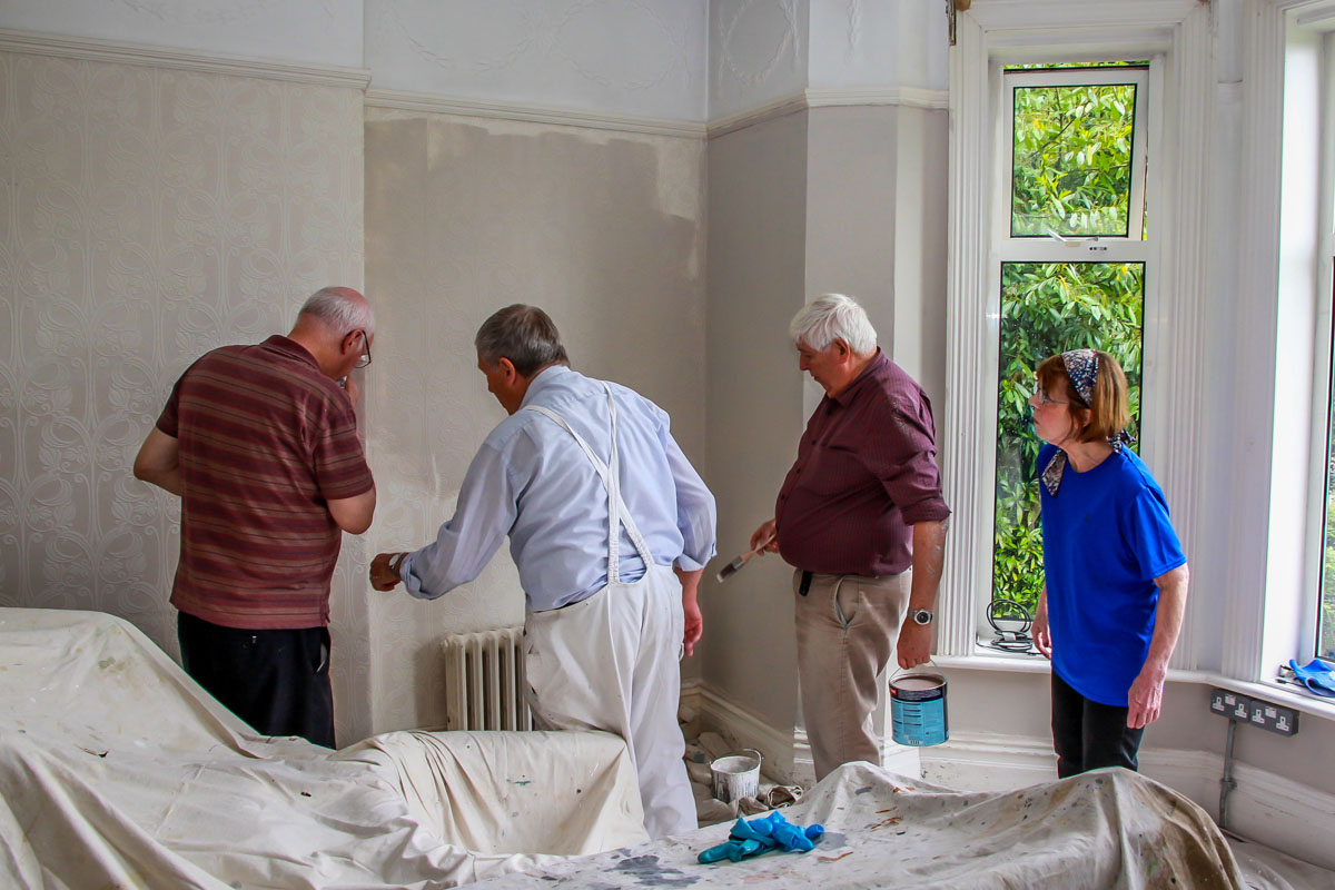 Decorating at Norwood House - Gordon casts his expert eye over the work.