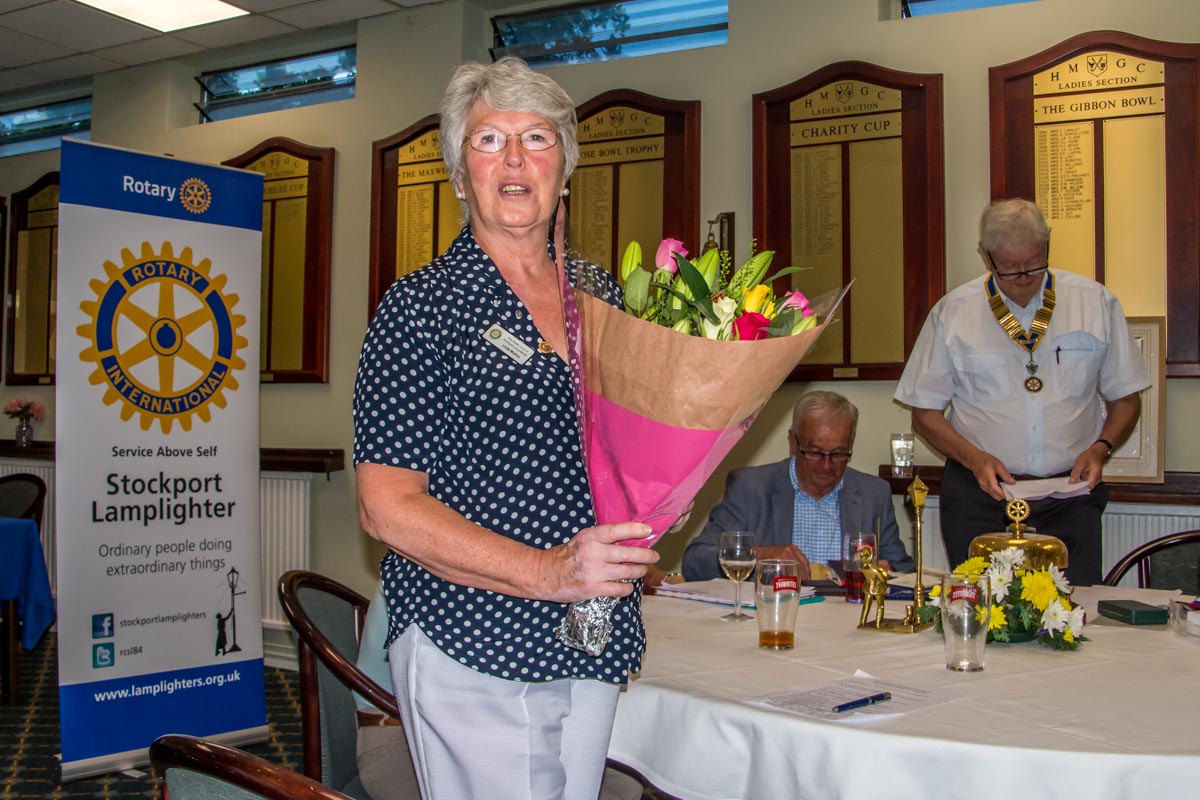 Club Assembly - A bouquet for Linda.