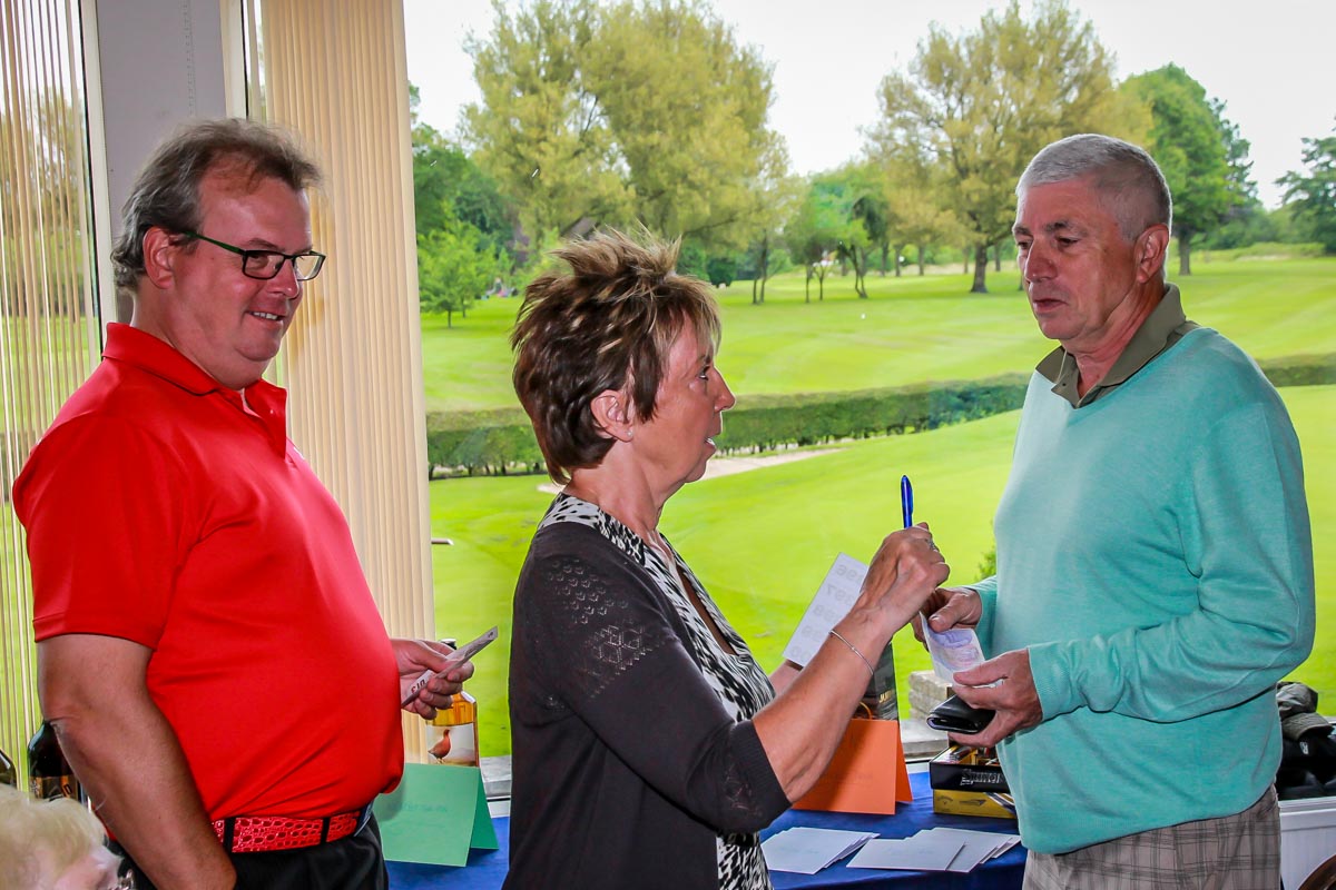 Charity Golf Day - Mary selling her raffle tickets.