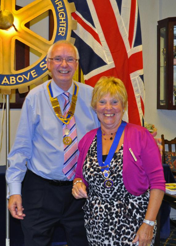 Club Assembly - Bill presents Carol with her Past President jewel.