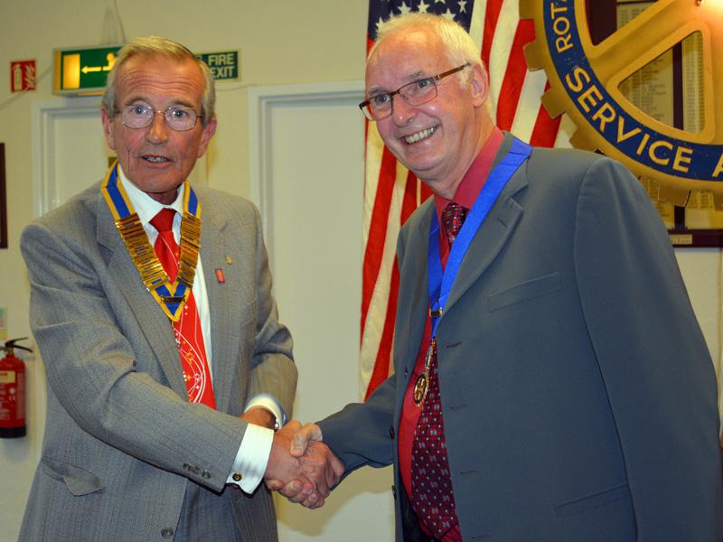 Club Assembly - Tony presents Bill with his Past President's Jewel.