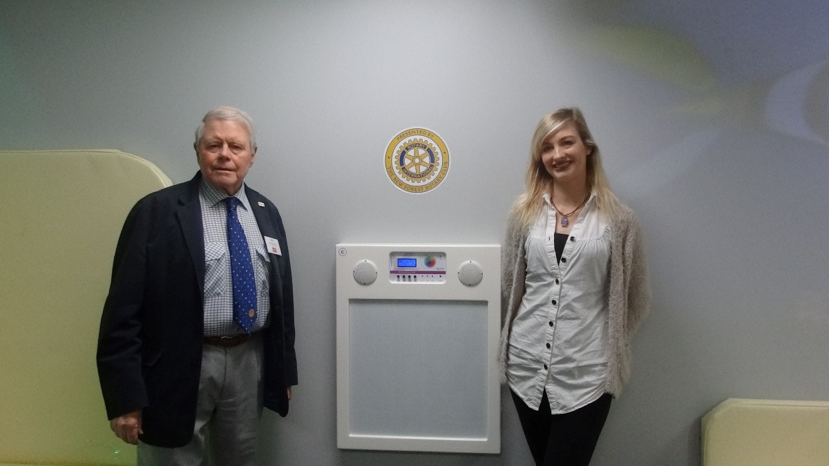 ROSE ROAD  SENSORY ROOM - President Lawrie with Kim Barton, the Chief Community Fund Raiser for Rose Road, with the  Musical LED Touchwall, one of the two pieces of equipment we funded.