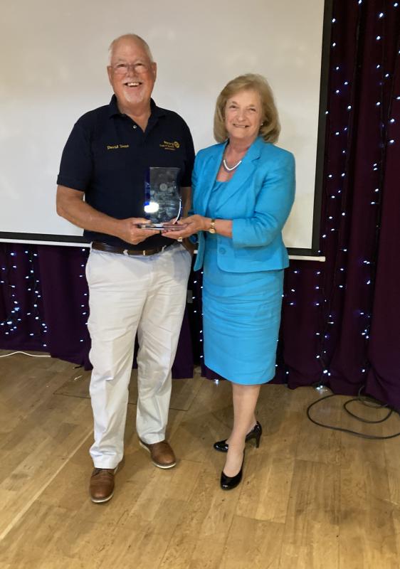 Presidential Handover June 2022 - Joyce carter presents the Kevin Carter trophy for Rotarian of the Year to David Dent
