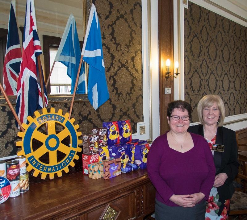 Rotarians donate to the URC Food Angel Foodbank - Rtn. Rev. Branwen Rees with Secretary Betty