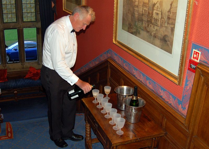 District Conference - Richard's quite good at pouring Champagne.