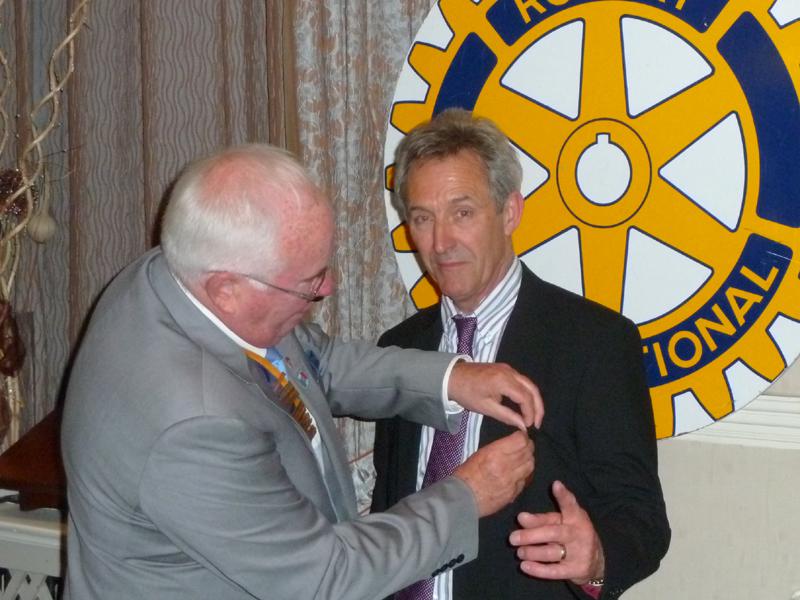 Handover Meeting - John Doyle receives his PP badge from new president Bill Thomas
