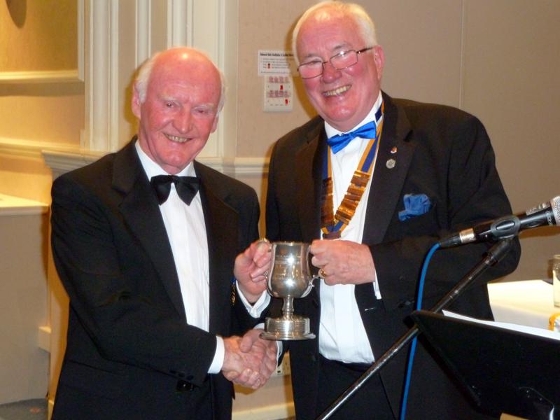 The Rotary Club of Southport Links Charter Night - Bill Thomas presents the President's Cup to Wallace Hooper