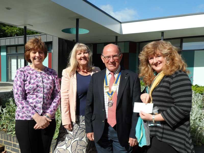 9 May 2014 - visit to Stony Dean School - In the courtyard outside the new building - Head Mrs Pauline Dichler, Deputy Head Mrs Linda Revill and Mrs McDonald with Club President Roger Wyborn.
