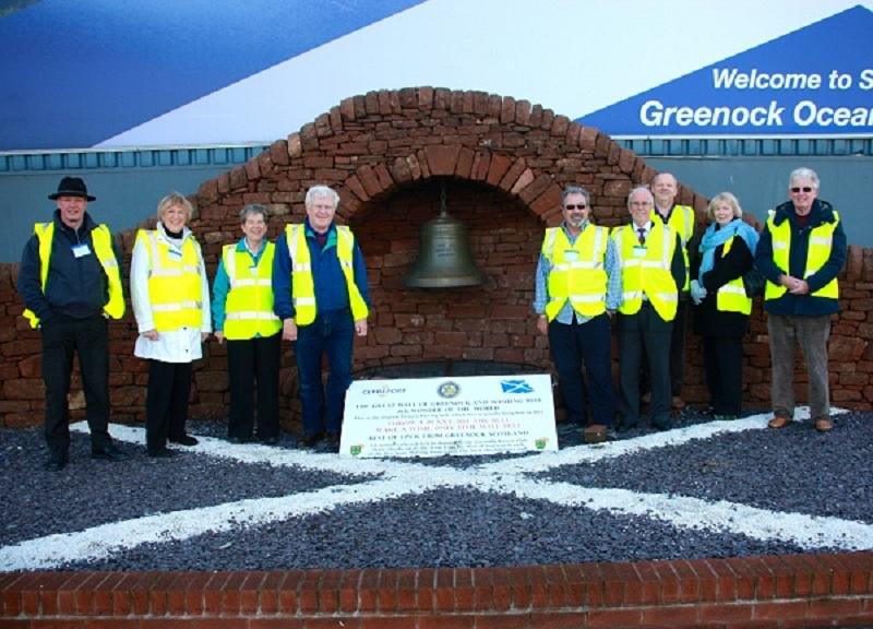 Oct 2012 -  RIBI President John Minhinick visits Greenock - The group, including Greenock Rotary President Mike Kimpton and Gourock Rotary president John MacLeod pose for a photo with their colourful safety vests.