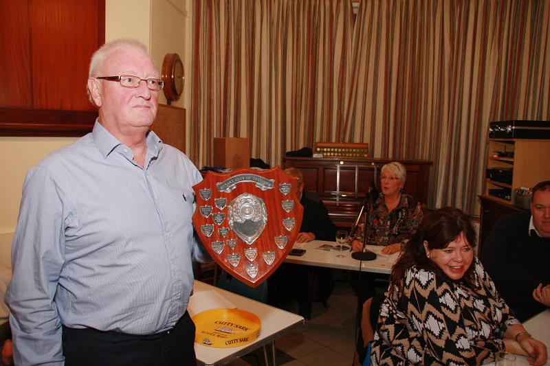 2013 Jubilee Quiz - President Ken displays the shield which the teams would compete for 