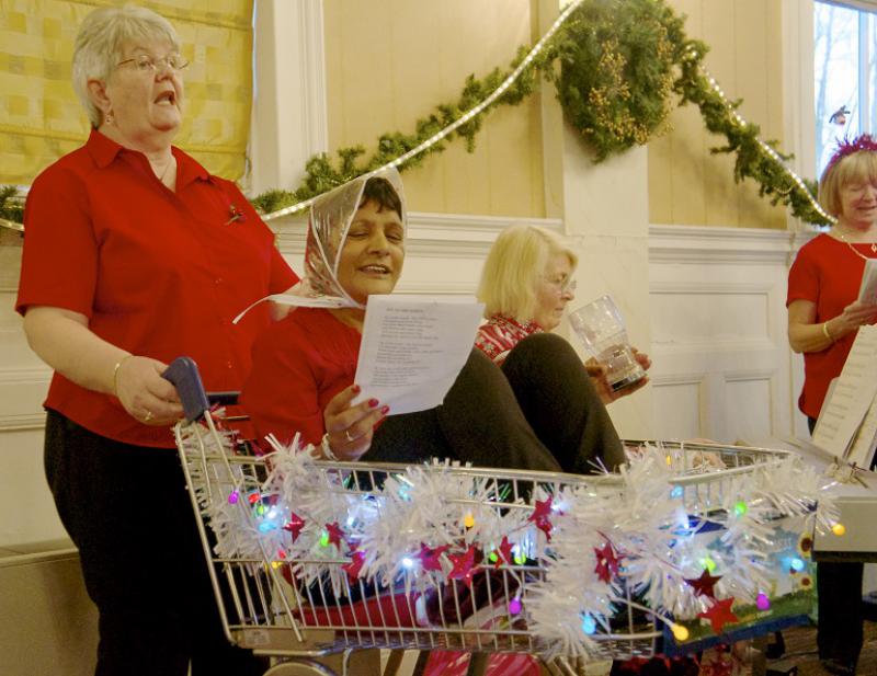 Diamond Jubilee Christmas Lunch     with Guest Speaker Right Reverend Lorna Hood  - The assistance of a trolley was required after the Hospice Choir's rendition of The Twelve Days of Christmas
