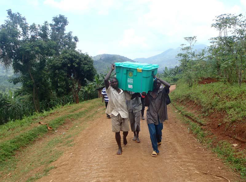 ShelterBox Disaster Response - The roads are impassible, so boxes have to be carried