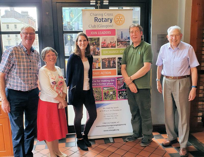 BECCA DRAUS, OUR 2020-21 ROTARY SCHOLAR - Becca with Club members around the Charing Cross Rotary Club banner.