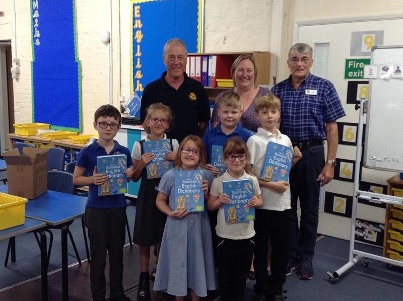 Dictionaries 4 Life 2019 - Rotarians Bob Foster and John Taylor with some of the pupils