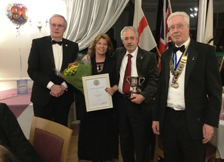 90th Charter Evening - 2017 - President Mike Clutton and Rotarian Philip Jones present the Club's Community Service Award to Gerrie Bailey (with partner Chris) of Chernobyl's Children 