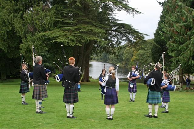 Family Fun Day, Duck Race & Hog Roast 25/9/11 - Corberry Pipers entertain the crowds