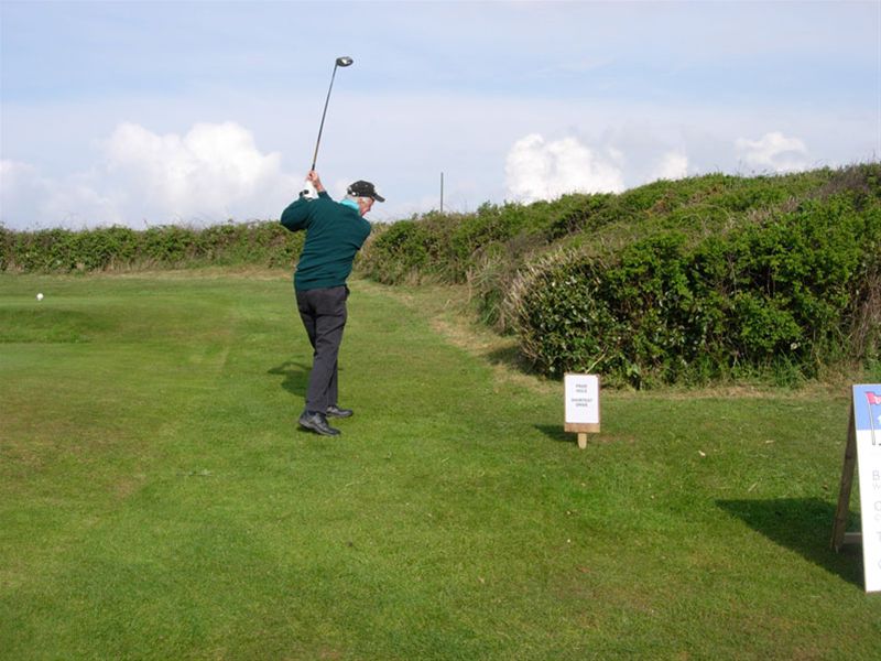 Golf Day 2010 - Brian tees off (in  the wrong direction)